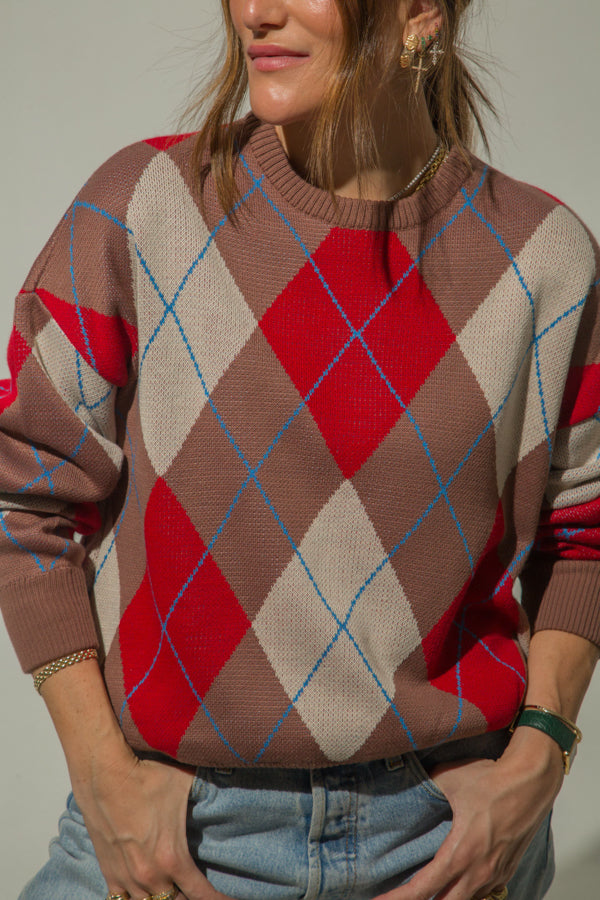 
                  
                    IRIS KNITTED SWEATER
                  
                