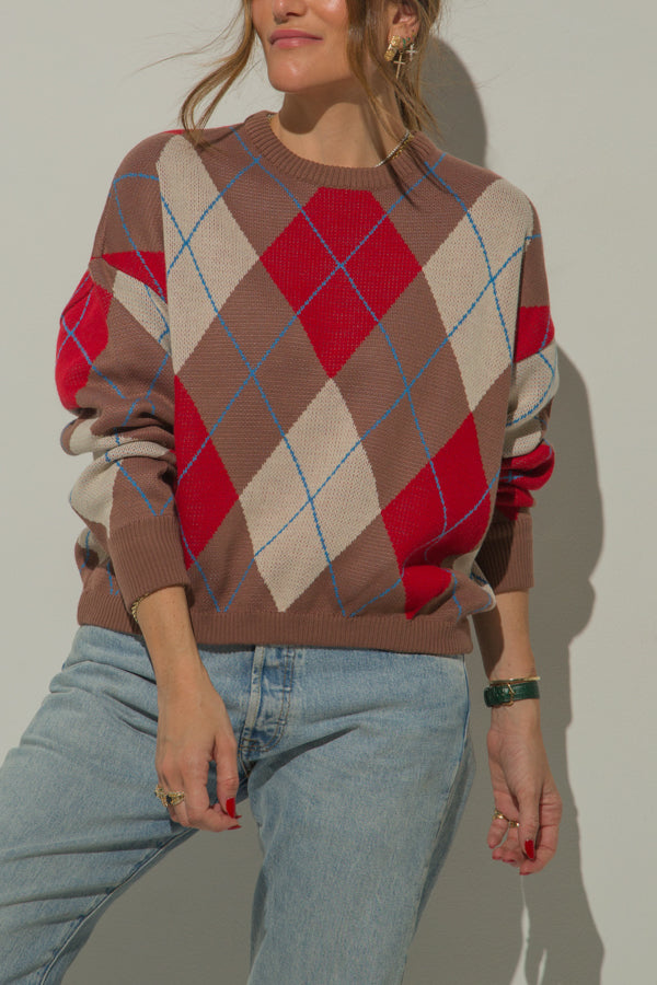 
                  
                    IRIS KNITTED SWEATER
                  
                